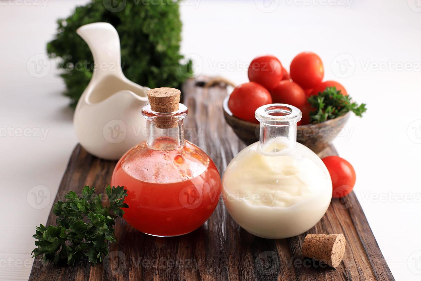 Spicy Sauce and Mayonaise on Small Bottle photo