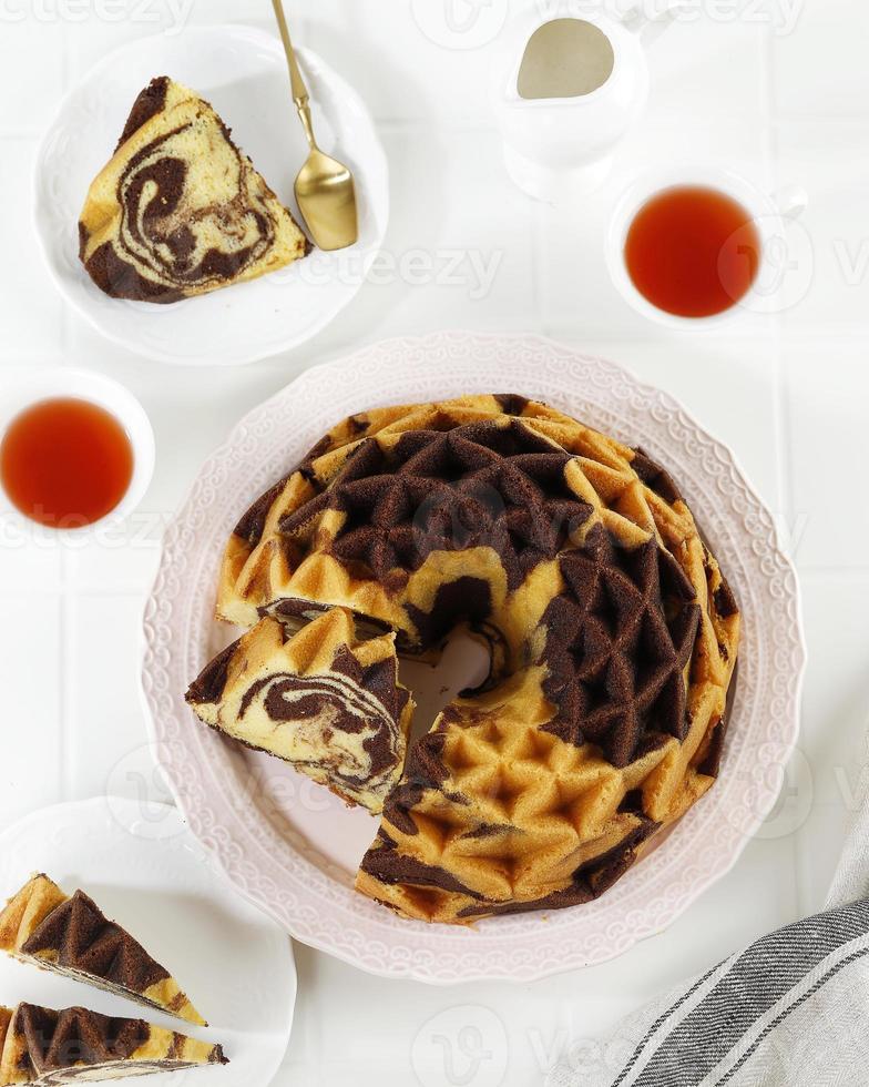 Top View marble Bundt Cake, Pound Cake or Butter Cake Sliced, Served with Tea photo