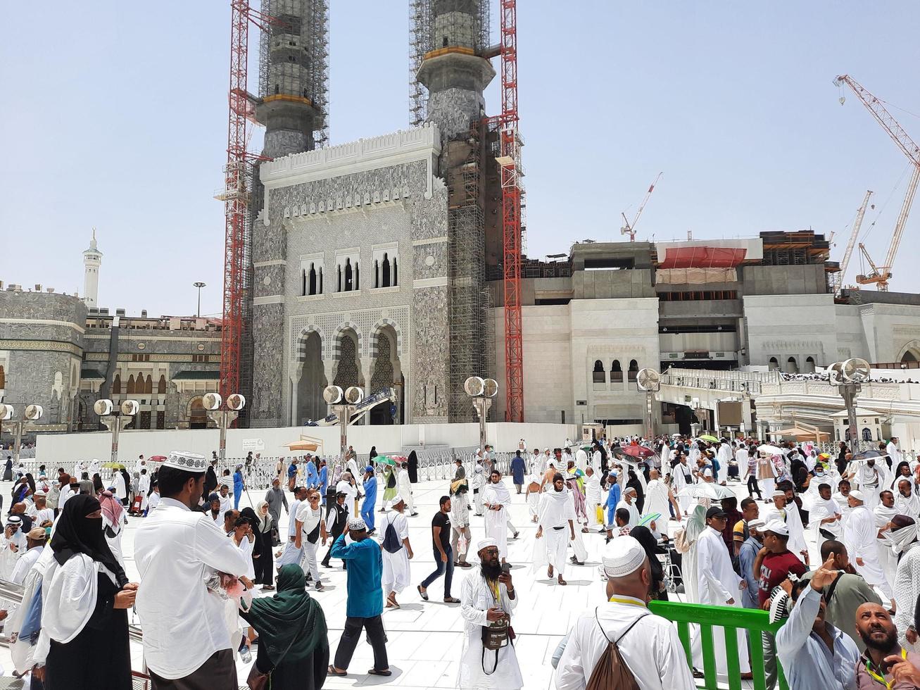 Mecca, Saudi Arabia, June 2022 - At the Masjid al-Haram in Mecca, pilgrims from all over the world gather in the outer courtyard after the Friday prayers. photo
