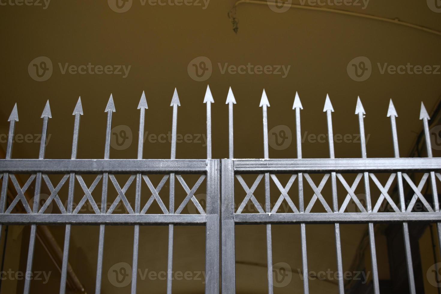 Abstract iron fence stakes gates for digital wallpaper design. Abstract concept. Design element. Modern design. Blue background. Retro style. Building architecture. photo