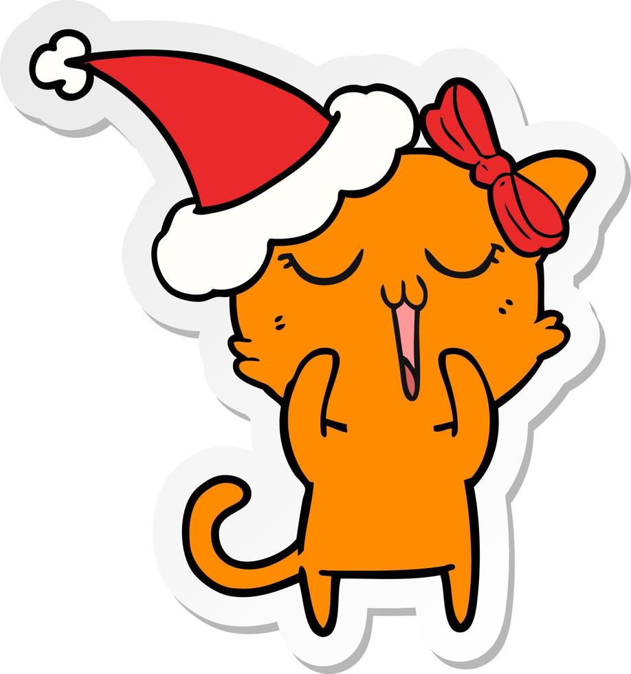 sticker cartoon of a cat wearing santa hat vector