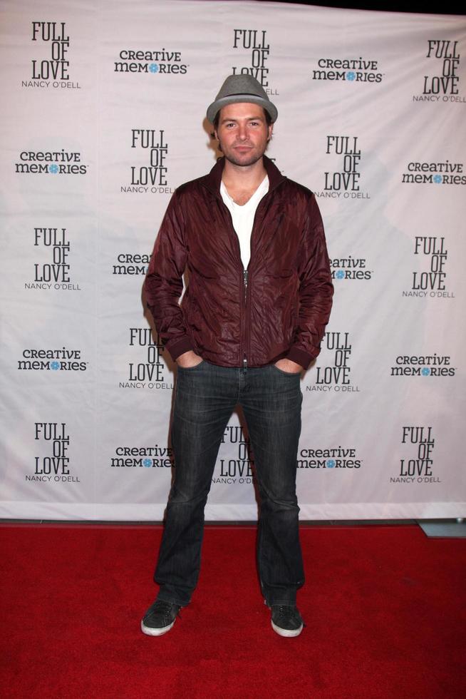 LOS ANGELES, OCT 25 -  Michael Johns arrives at the Full of Love  Book Launch Party at SLS Hotel on October 25, 2010 in Beverly Hills, CA photo