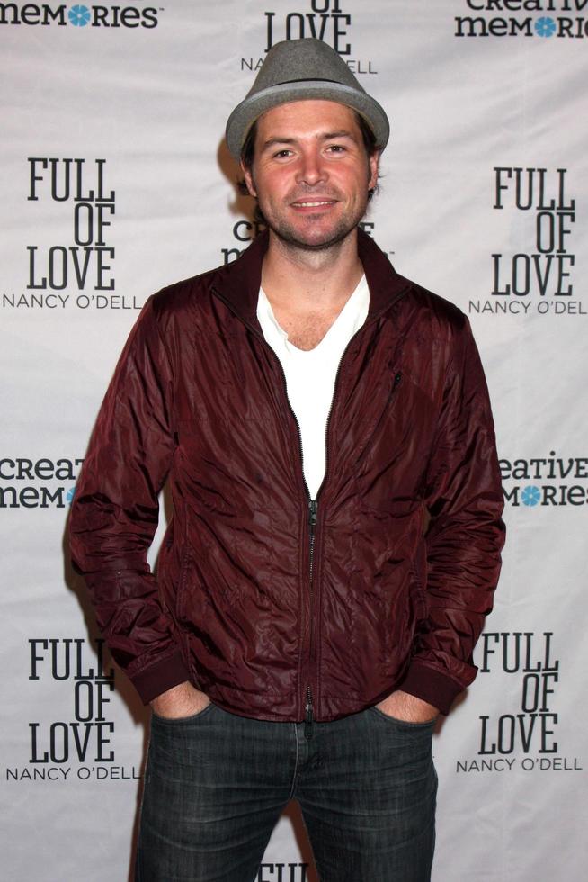 LOS ANGELES, OCT 25 -  Michael Johns arrives at the Full of Love  Book Launch Party at SLS Hotel on October 25, 2010 in Beverly Hills, CA photo