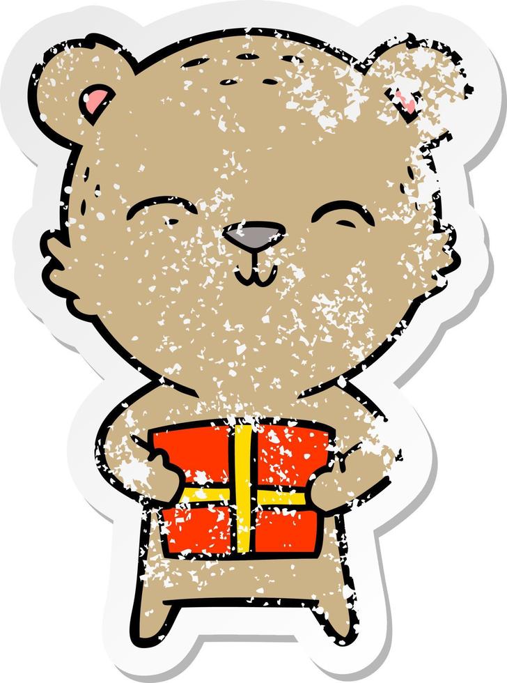 distressed sticker of a happy cartoon bear with gift vector