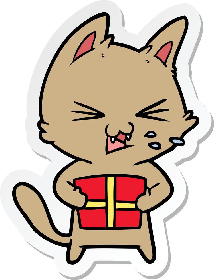 pegatina de un gato silbante de dibujos animados con regalo de navidad vector