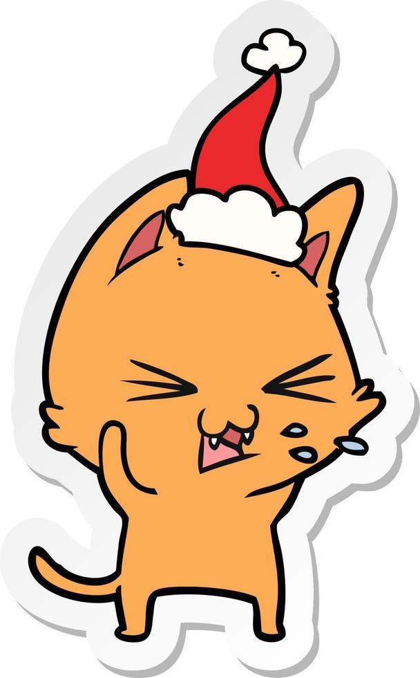 sticker cartoon of a cat hissing wearing santa hat vector