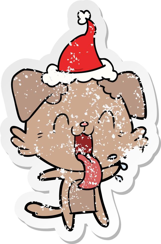 distressed sticker cartoon of a panting dog wearing santa hat vector