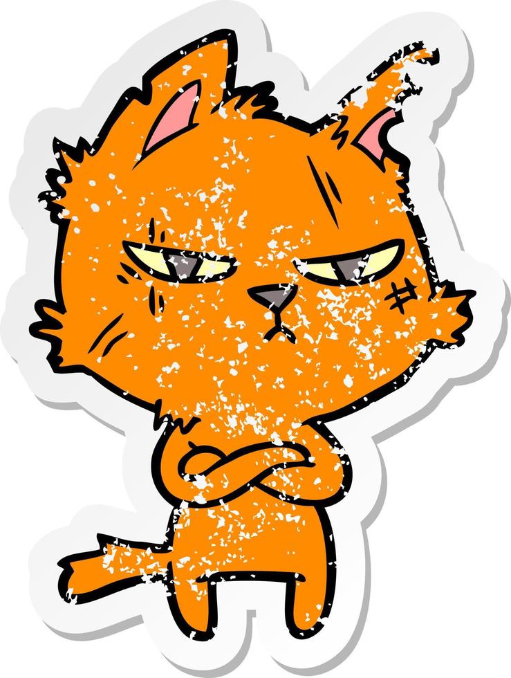 distressed sticker of a tough cartoon cat folding arms vector