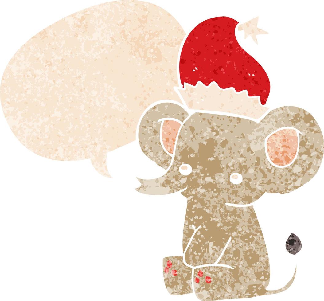 lindo elefante navideño y burbuja de habla en estilo retro texturizado vector
