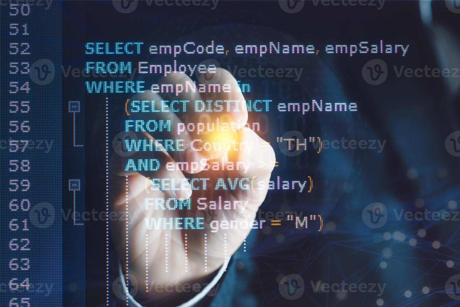 System analyst or businessman coding SQL Structured Query Language code. Example of SQL code to query data from a database. photo