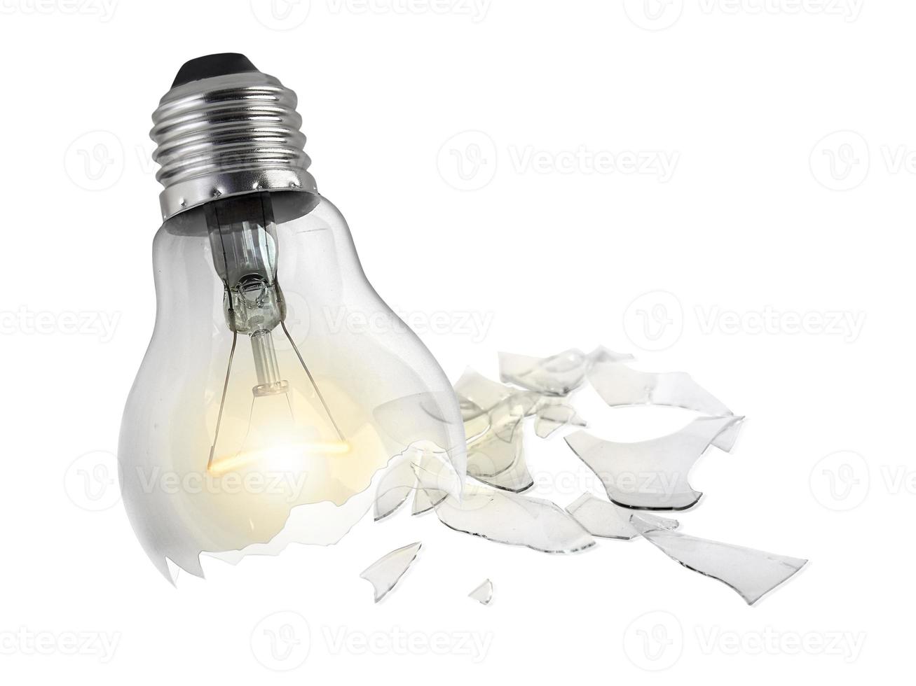 Broken light bulb isolated on white background photo