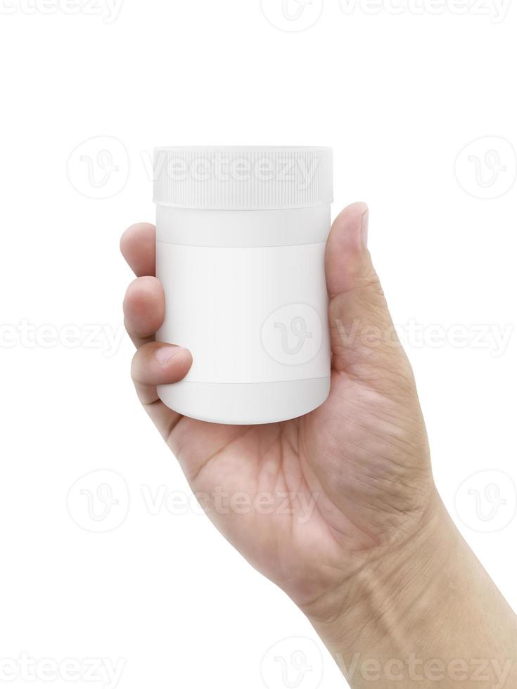 hand holding of pills bottle with blank label. with isolated on white background photo
