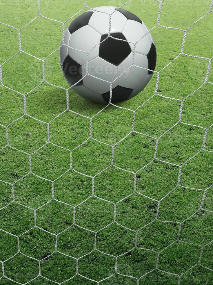 Close-up soccer ball on green grass photo