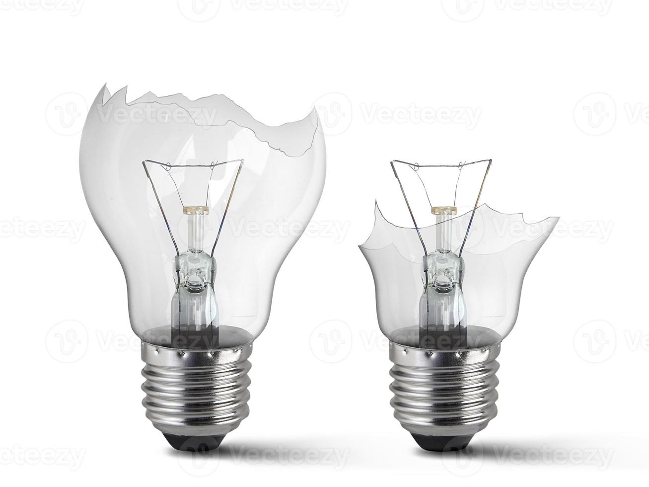 Broken light bulb isolated on white background photo