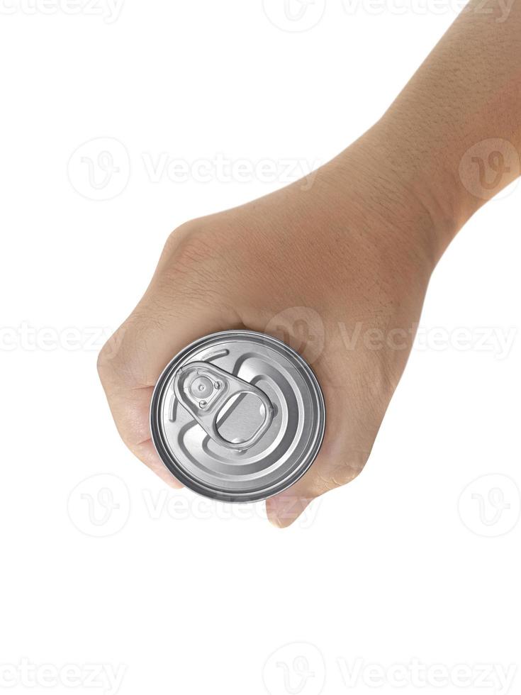 Top view Canned fish holds in his hand isolated on white background photo