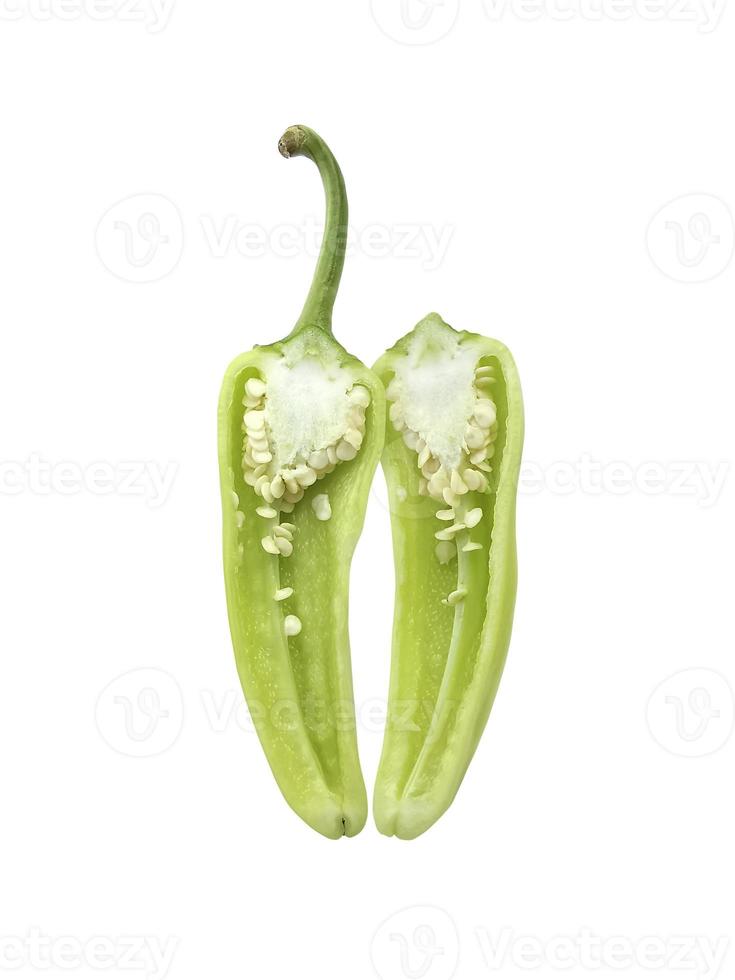 sliced green hot chili peppers isolated on white background photo