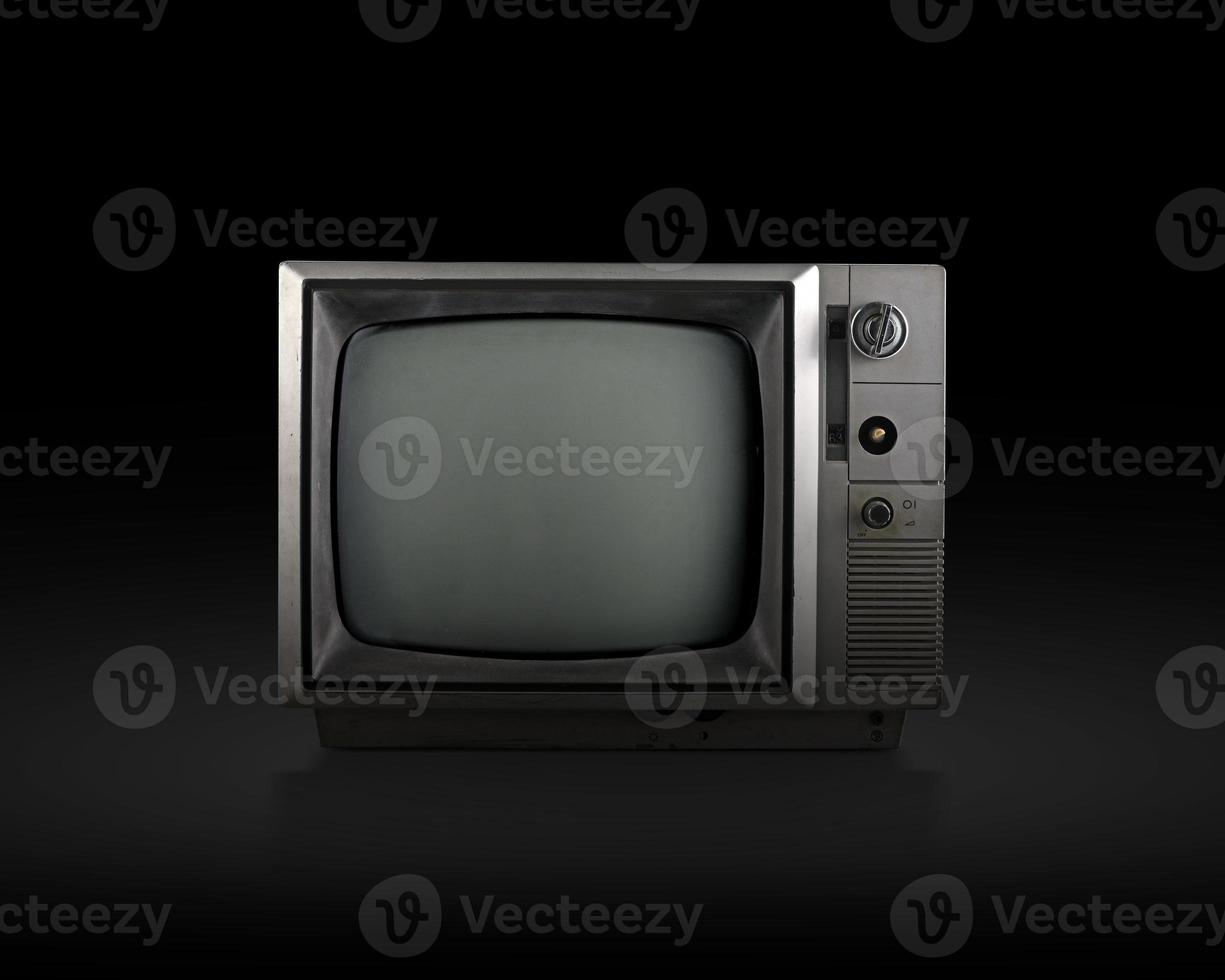 retro old television on black background photo