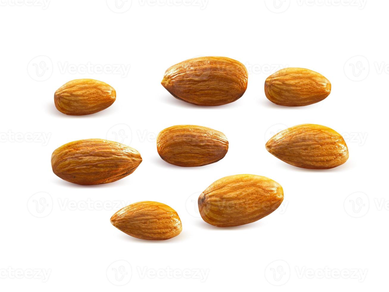 Almonds isolated on white background photo