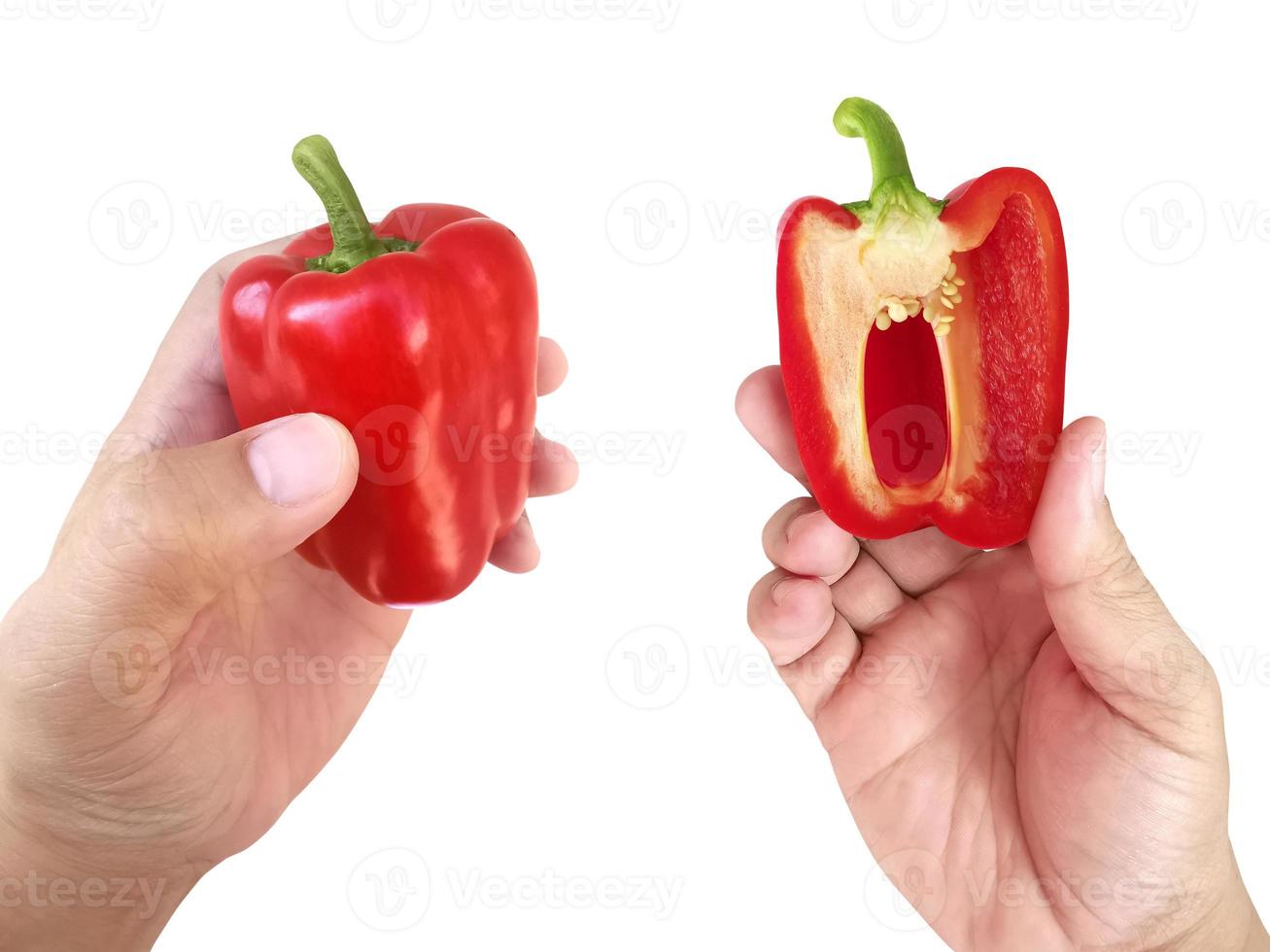 hand holding red Bell Pepper isolated on white background photo