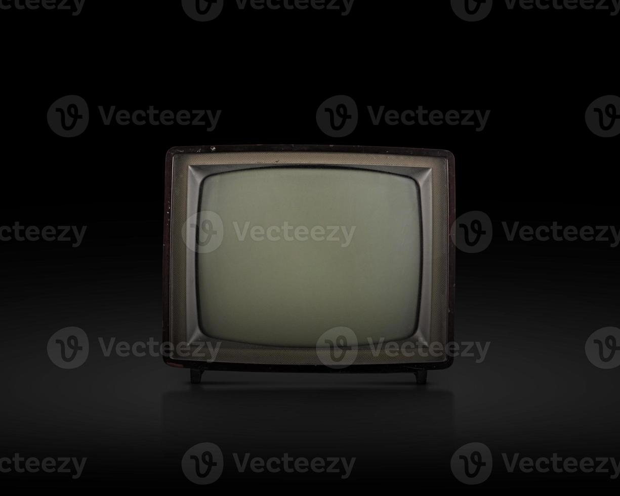 retro old television on black background photo