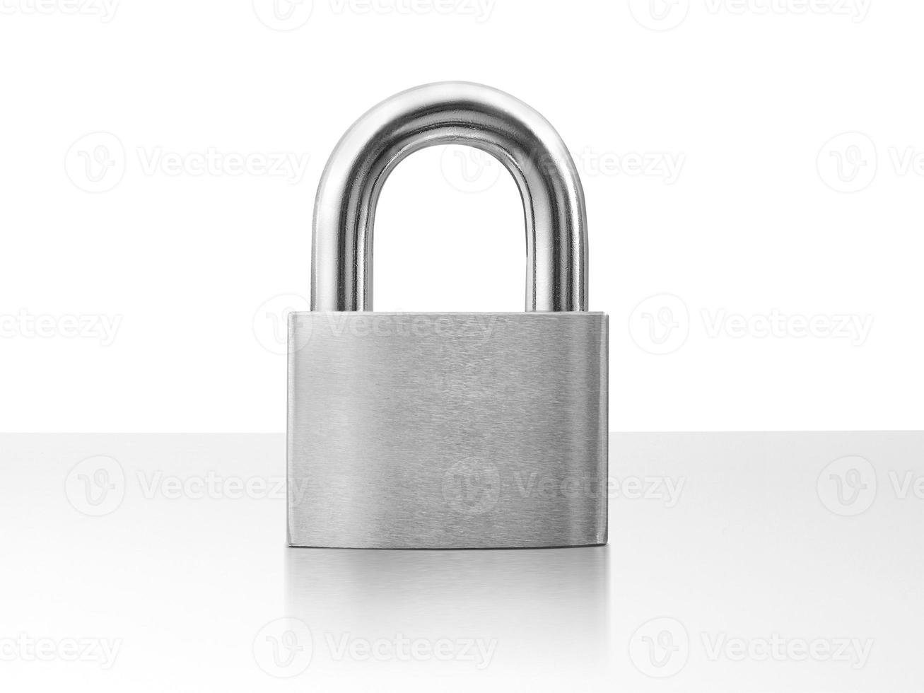 Lock padlock on white table photo