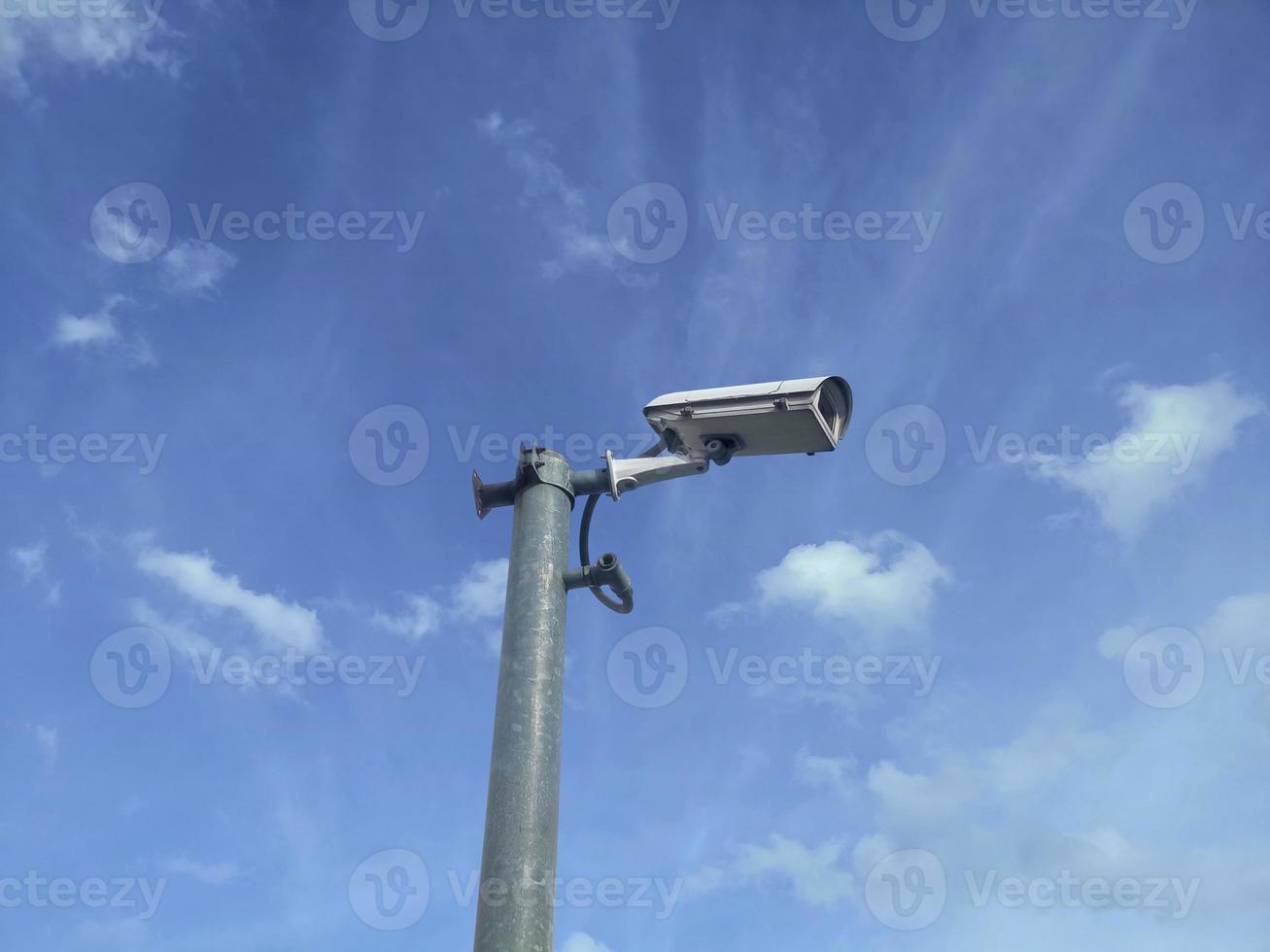 closed circuit camera Split on the sky background photo