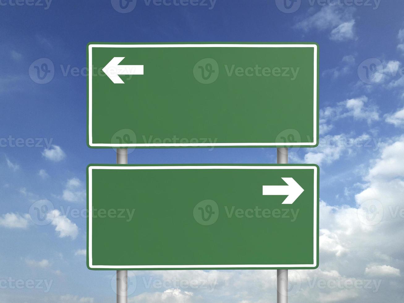 Empty road sign against a background of blue sky with clouds photo