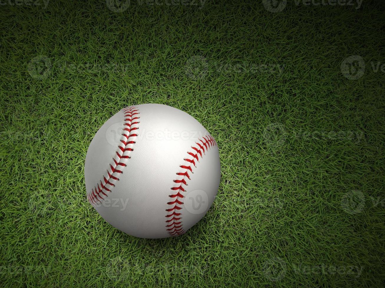 Baseball on the green turf close-up photo