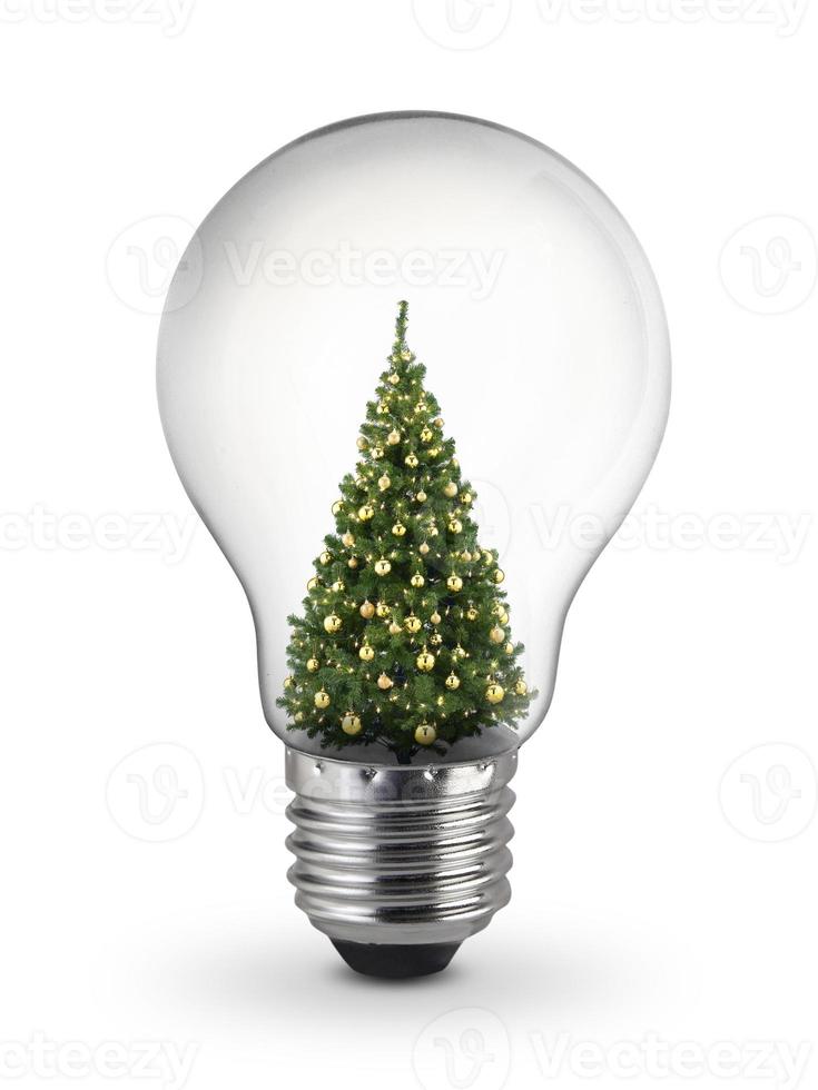 decorated Christmas tree inside of light bulb on White Background, Inspiration concept photo