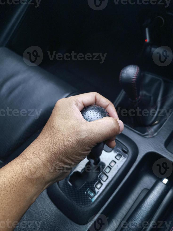 Detail of Hand in gear shift photo