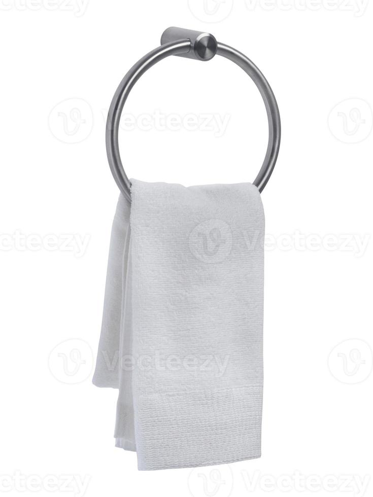 White hand towel hanging on hanger in toilet bathroom photo