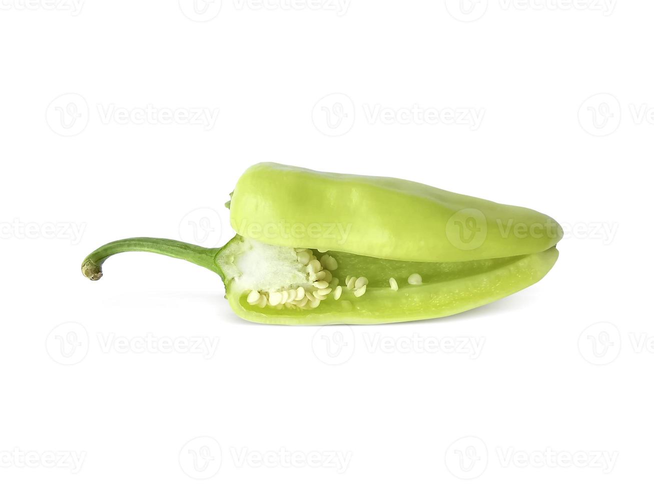 sliced green hot chili peppers isolated on white background photo