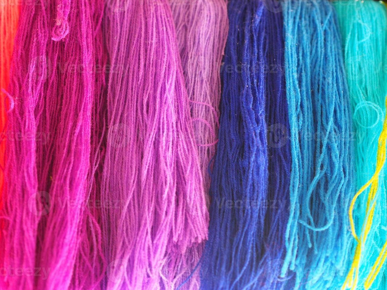 Yarn, several colors arranged abstract Gradient for background, Garn colorful pink orange red purple violet blue dark and soft color photo