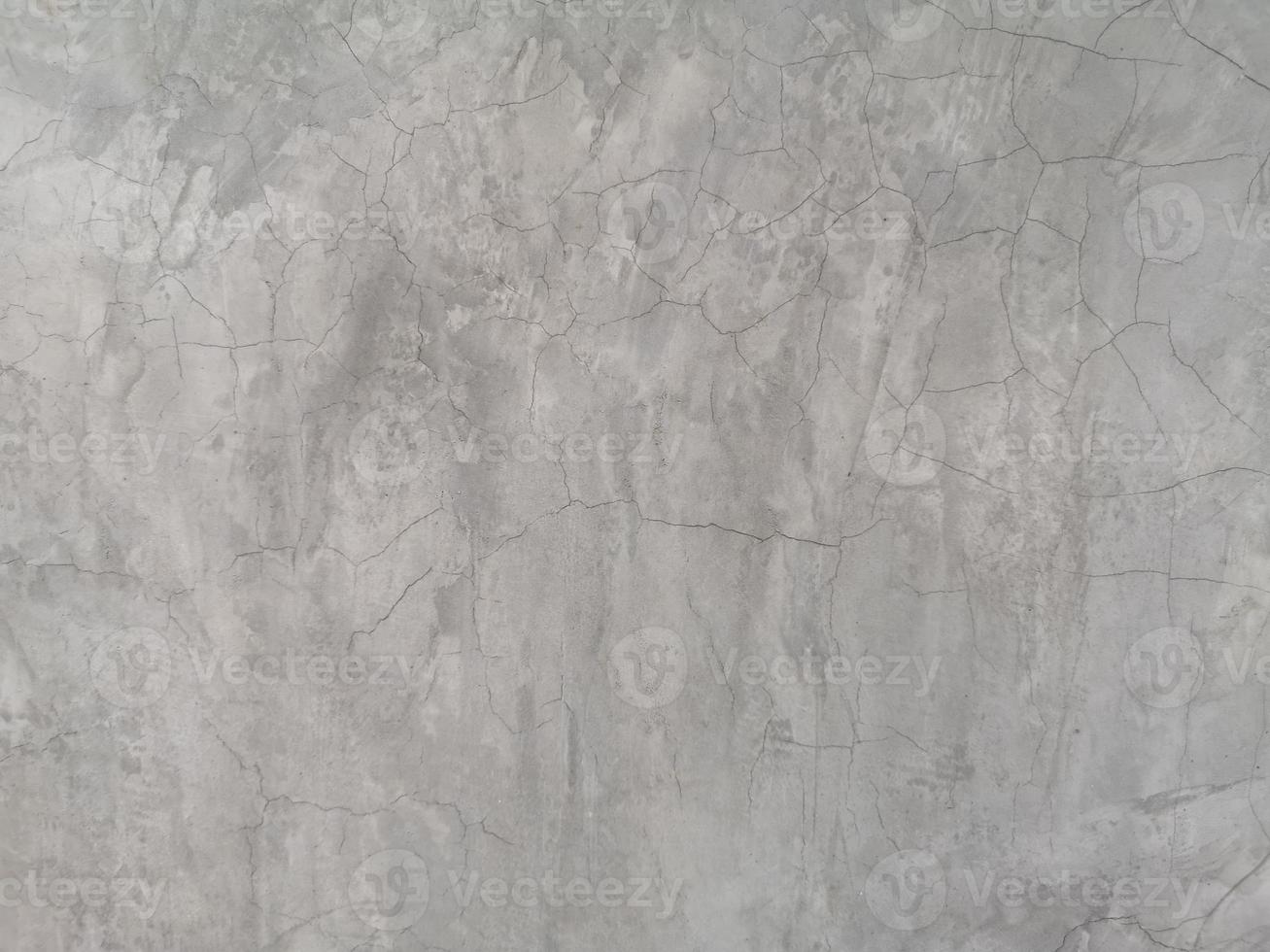 Grieta en la pared de cemento color gris pulido desnudo y textura de superficie lisa material de hormigón detalle de fondo vintage arquitecto construcción paredes de ladrillo enlucidas y pintadas foto