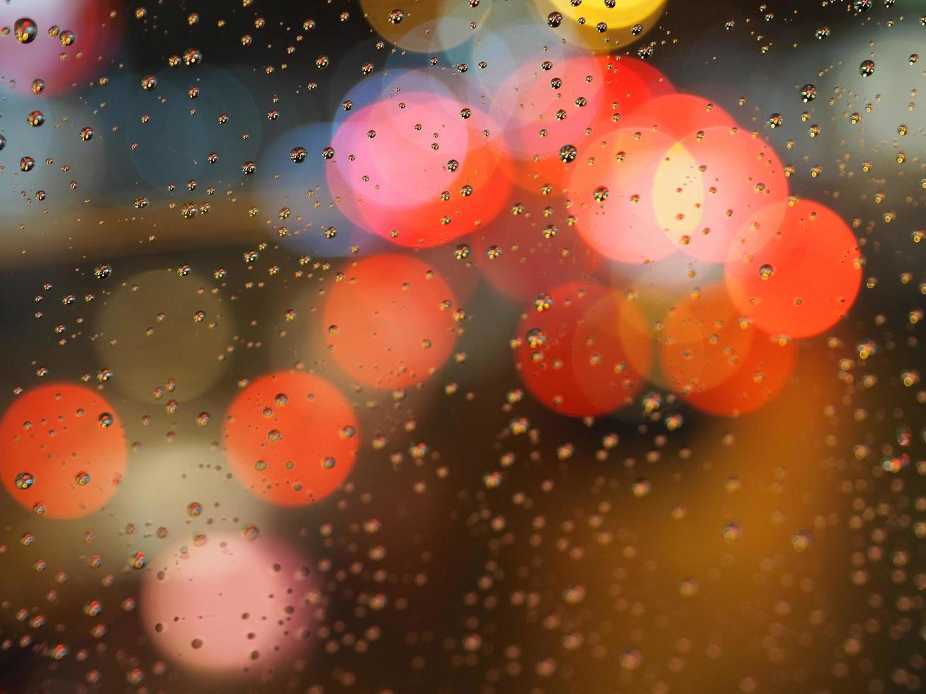 Rain drops Bokeh background Abstract light red white and yellow color bokeh beautiful blurred, Design for paper art web mobile applications covers card infographic banners social media and copy write photo