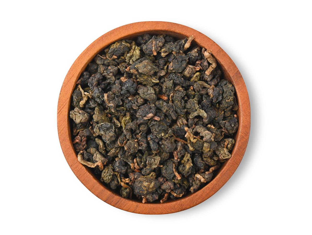 Chinese oolong tea Tie GuanYin isolated on white background. Top view photo