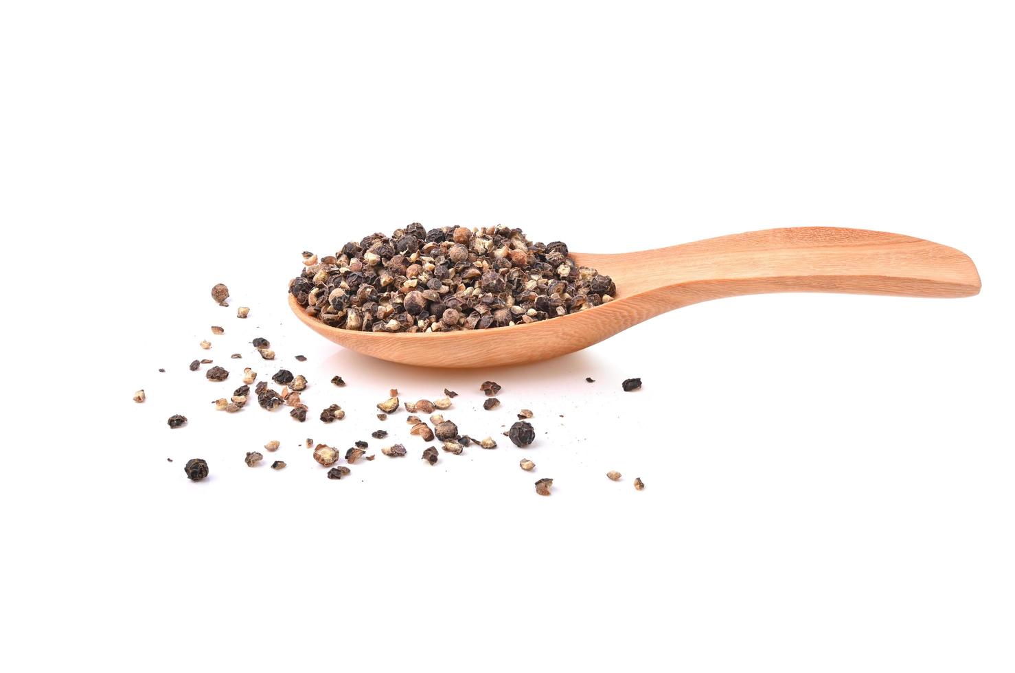 Ground black pepper isolated on a white background . photo