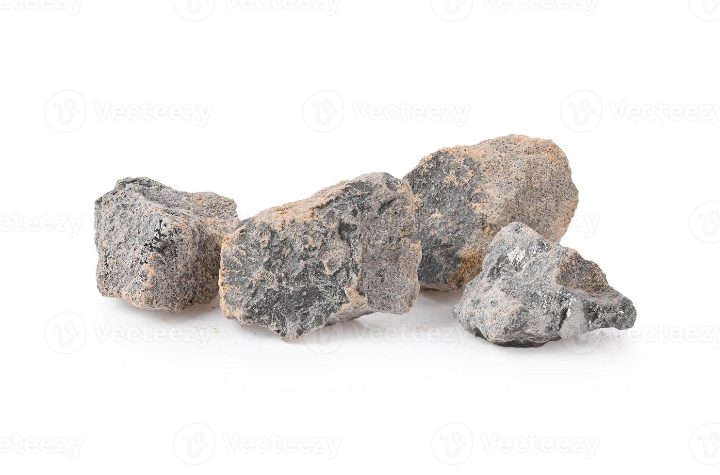 Calcium carbide lump isolated on white background photo