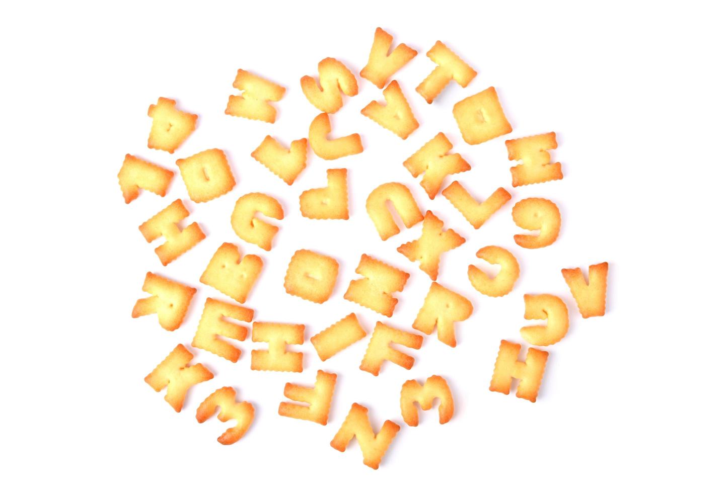 Cracker font, Cookie font alphabet isolated on white background. Top view. photo