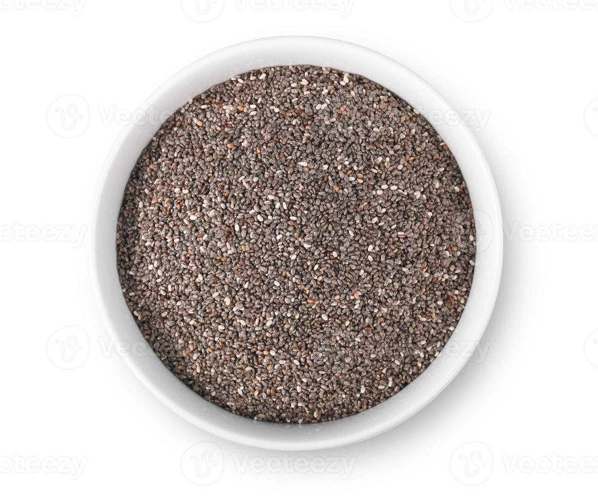 Chia seeds in bowl isolated on white background. Top view photo