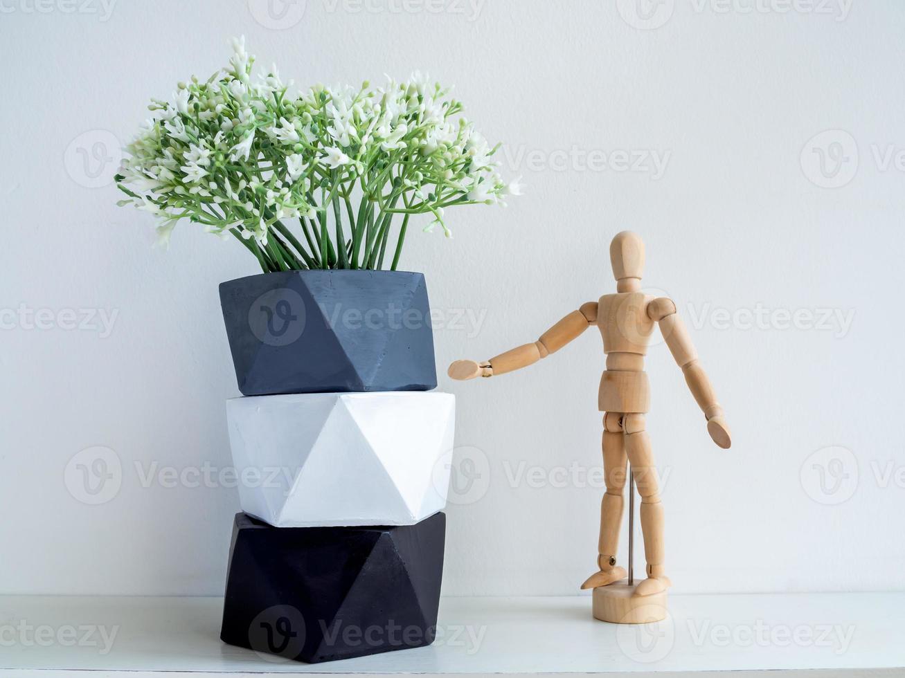 Modern pentagon concrete planters. Painted concrete pots for home decoration photo