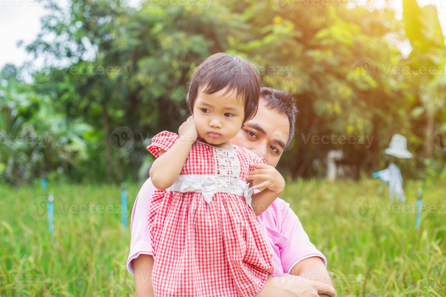 Piggyback of baby and dad photo