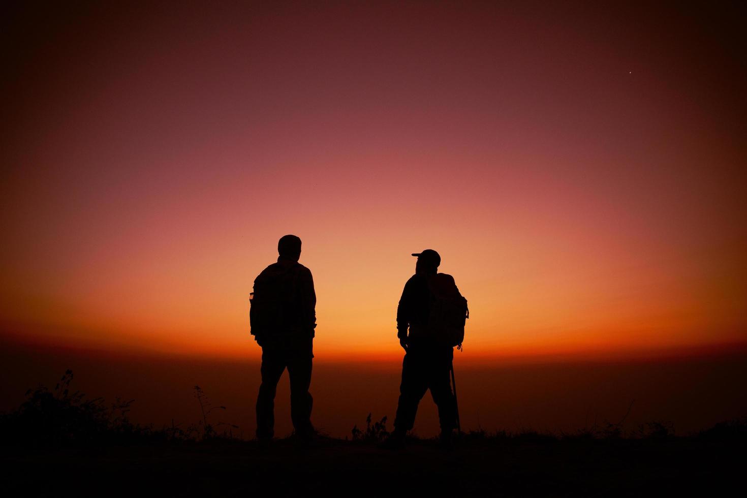 Hiker with backpack photo