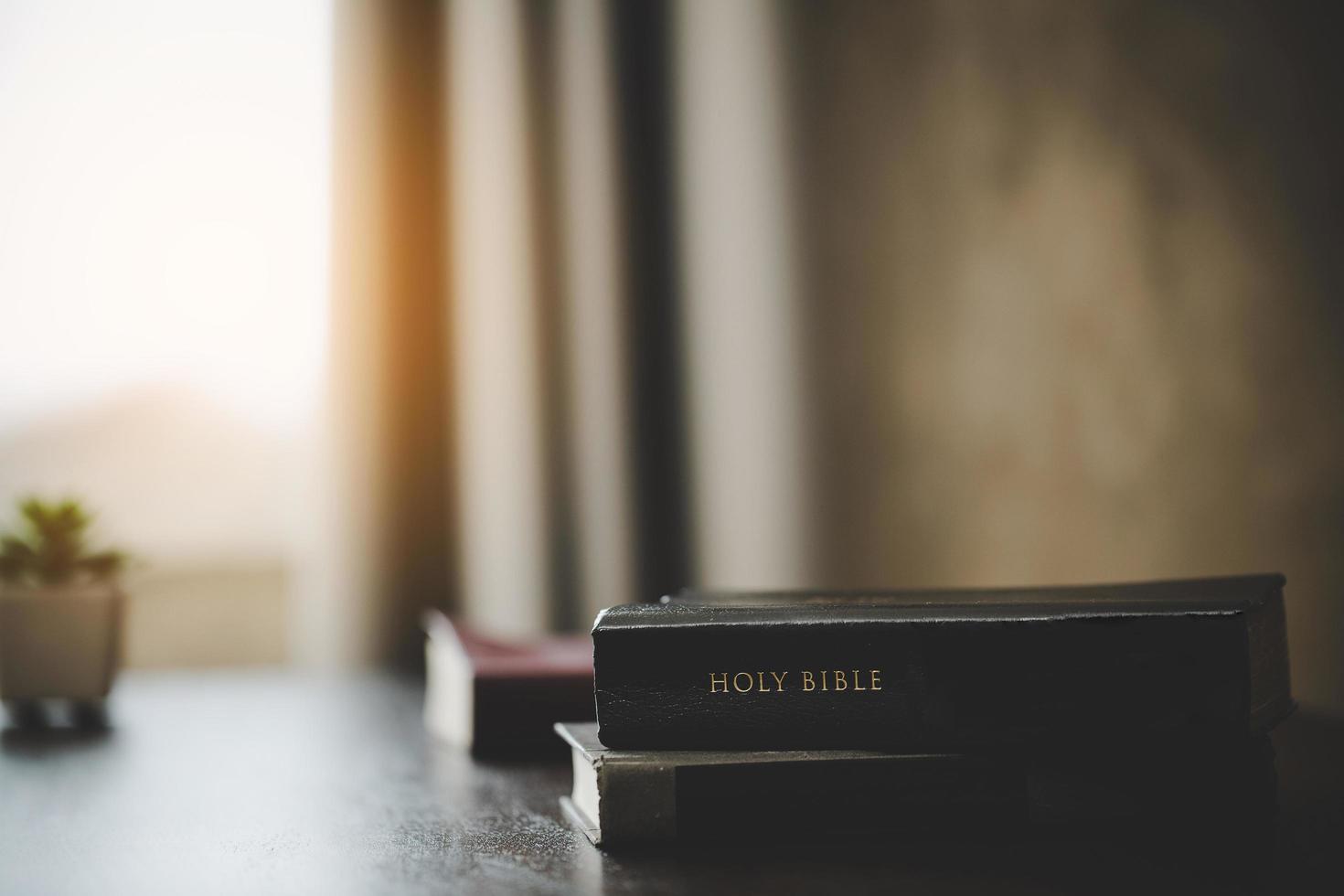 The bible is placed on the table photo