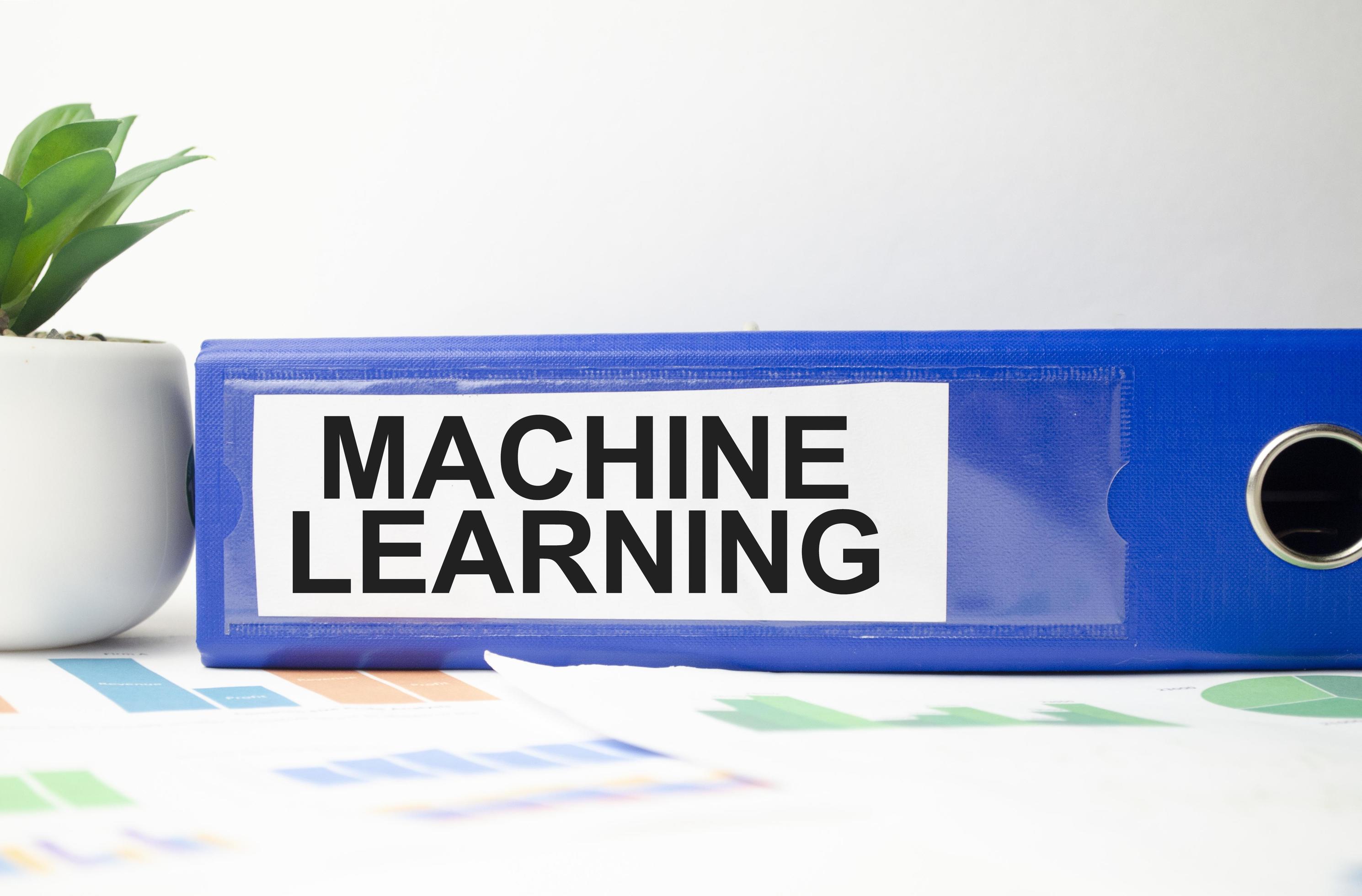 machine learning text written on folder with documents 8623478 Stock ...