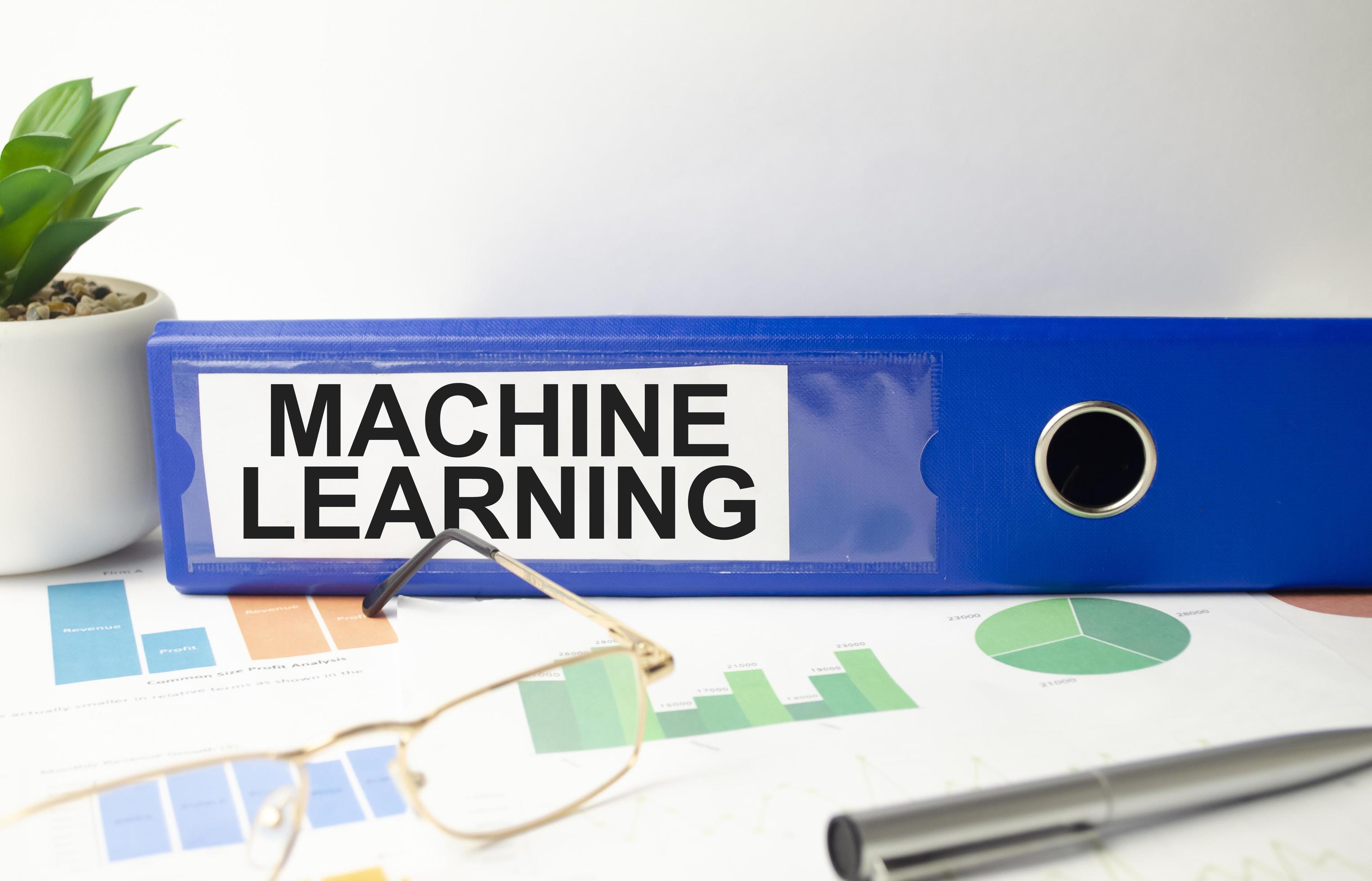 machine learning text written on folder with documents 8623497 Stock ...
