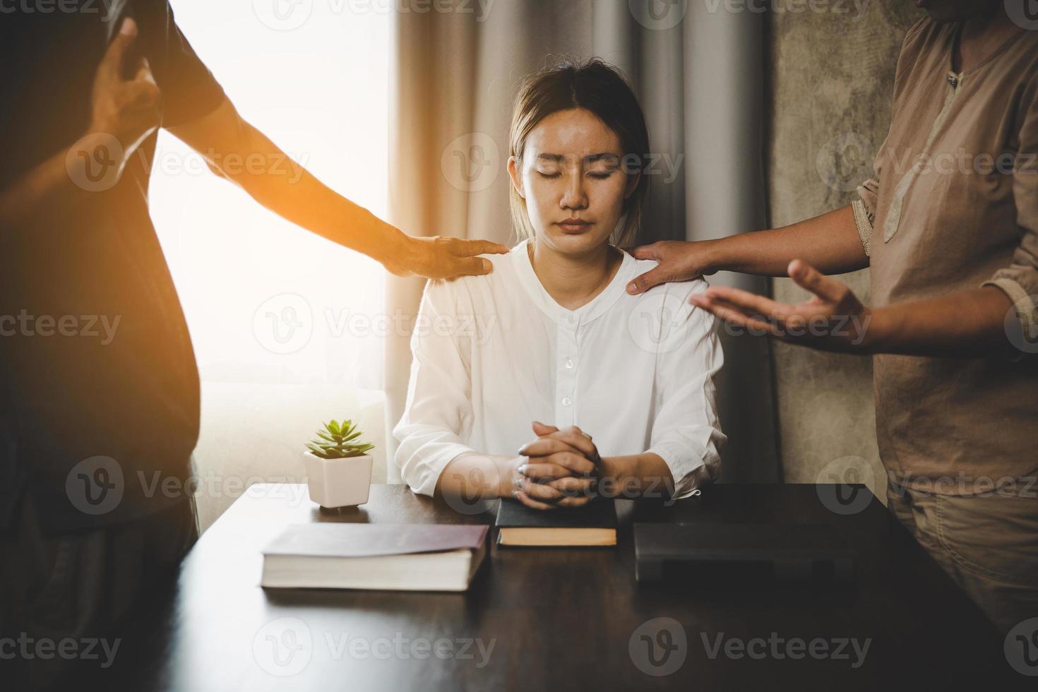 Group of people praying worship believe photo