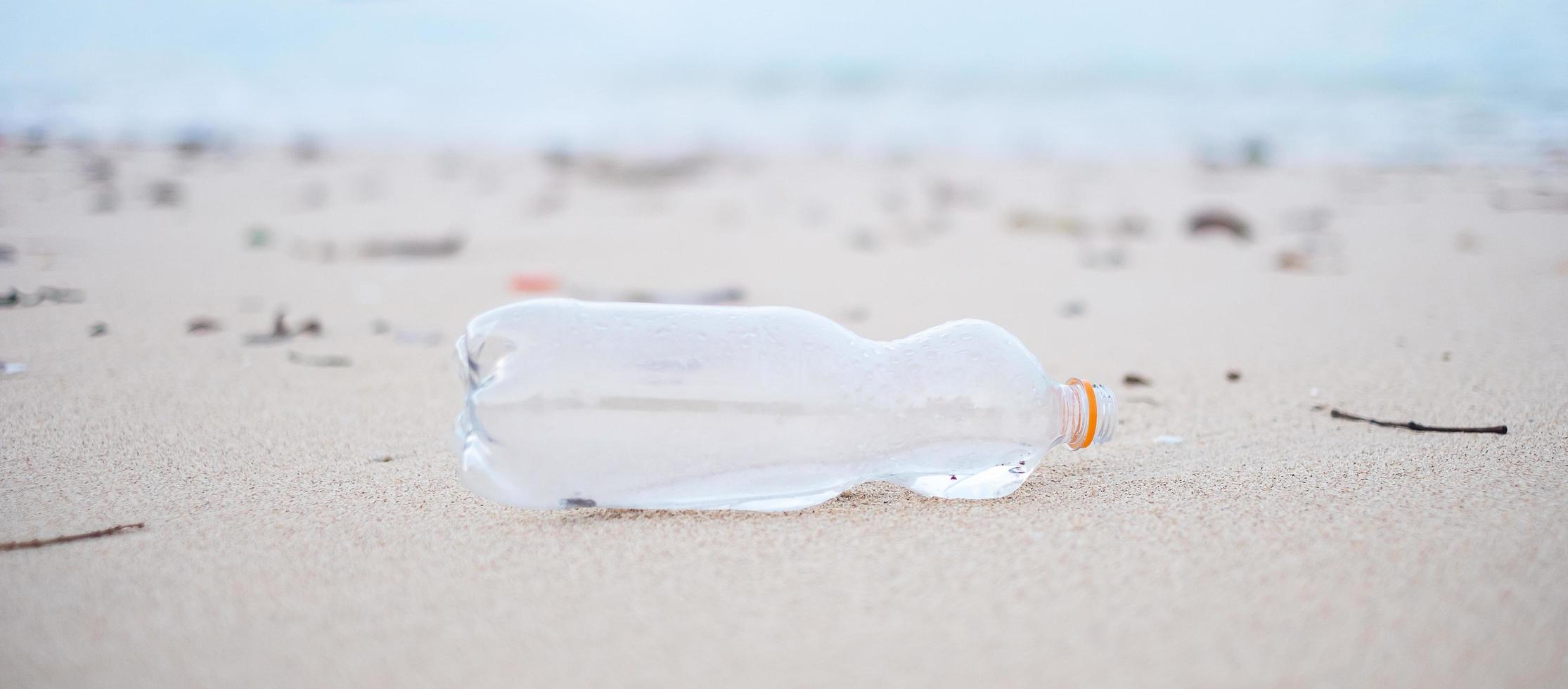 plastic Bottle garbage on the beach. Ecology,  Environmental, pollution and Ecological problem concept photo