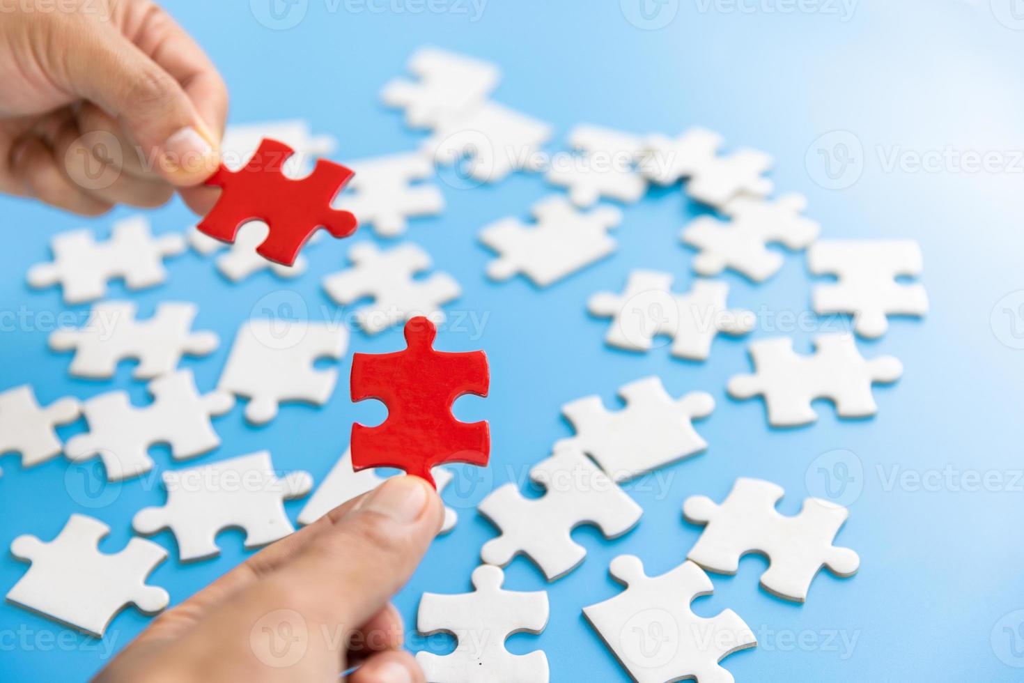 Human hands holding red jigsaw  with word problem  solution.  symbol of association and connection. business strategy. photo