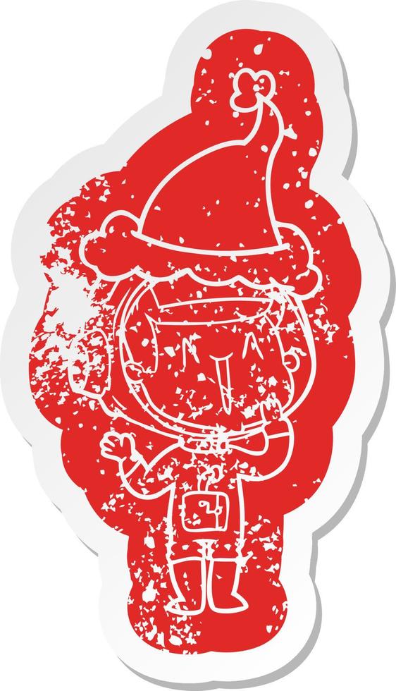 laughing cartoon distressed sticker of a astronaut wearing santa hat vector